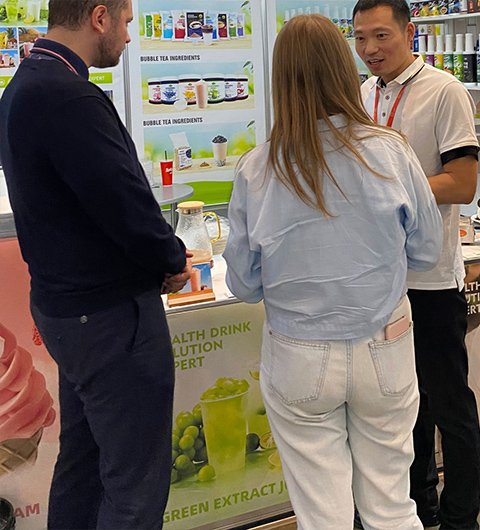 Welcoming Clients at the Booth